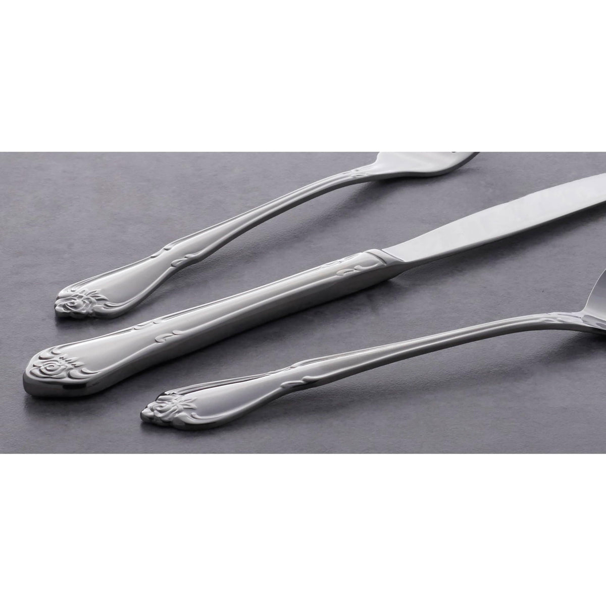 Oneida True Rose dining spoons arranged for relaxed entertaining
