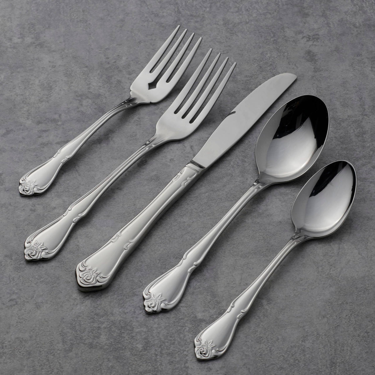 Oneida True Rose salad fork enhancing greens with grace