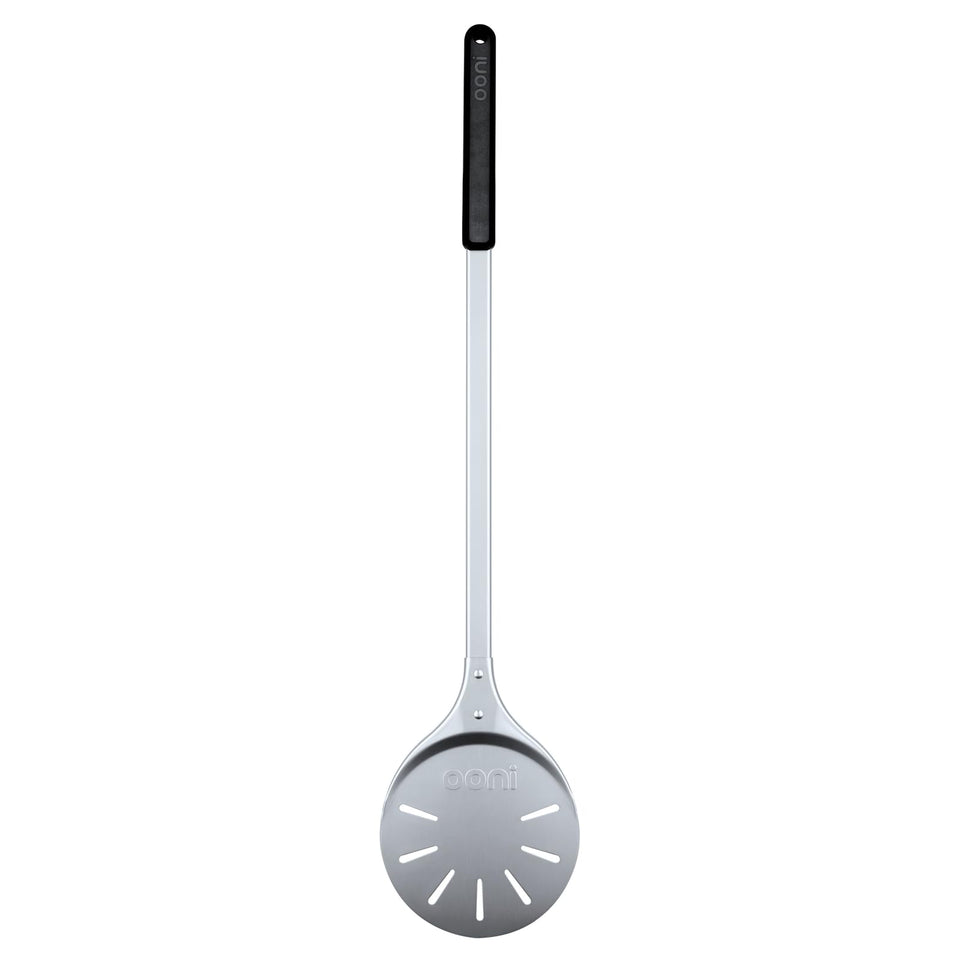Ooni pizza turning peel, 7-inch aluminum surface for easy sliding under pizza.