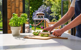 Ooni wooden peel moisture-resistant surface lasts through kitchen use.