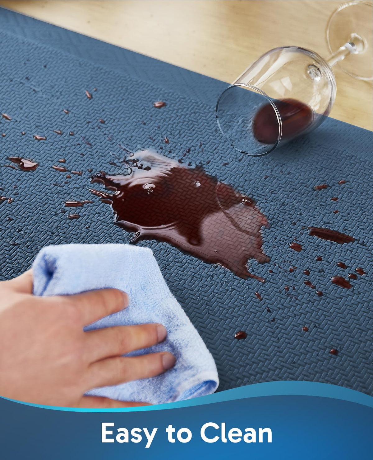 Ophanie waterproof surface protects against spills while cooking and cleaning.
