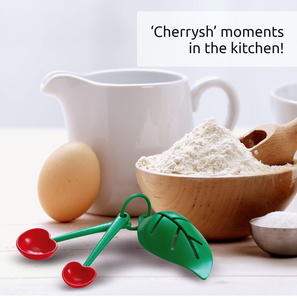 OTOTO Mon Cherry measuring spoons in a bright kitchen scene for baking