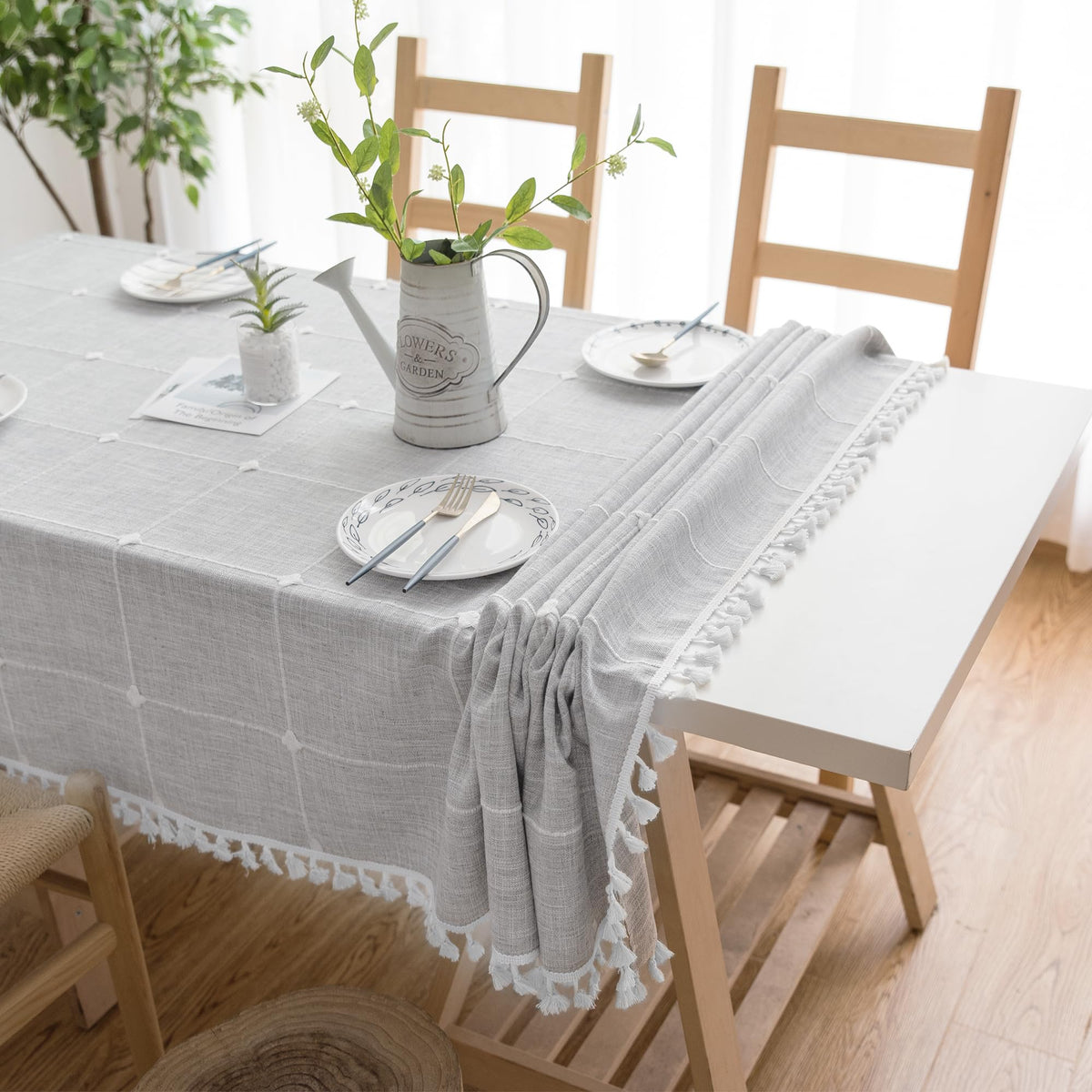 Oubonun grey tassel detail tablecloth adds subtle charm to gatherings