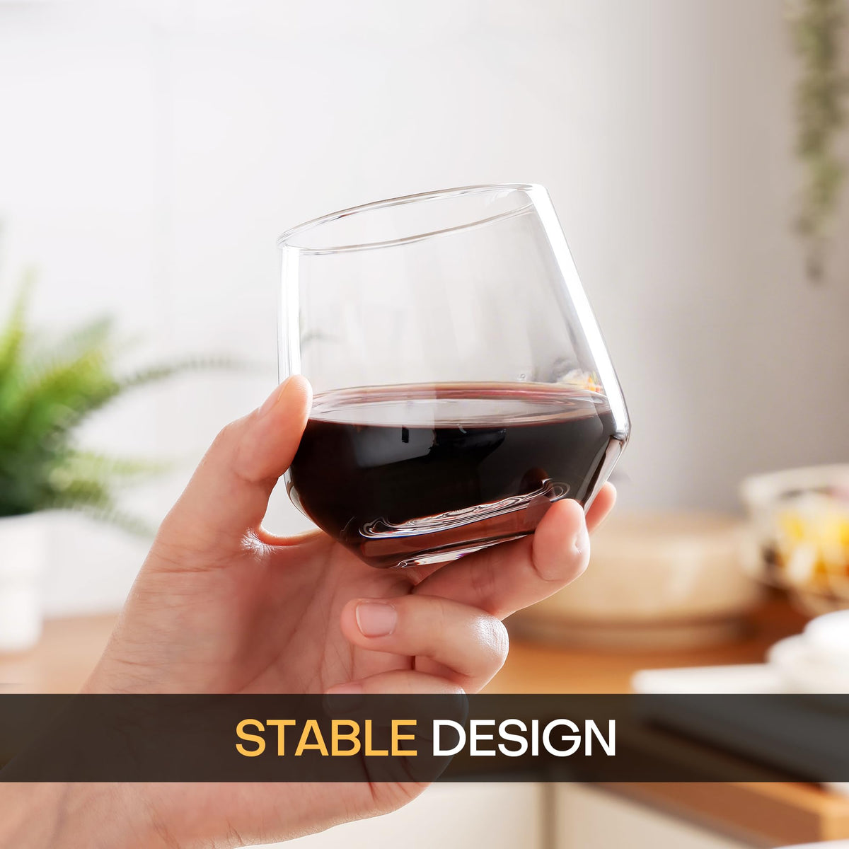 OUWO stemless wine glasses in hand for comfortable sipping.