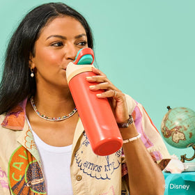 Owala Moana FreeSip base fits cup holders for traveler-friendly portability.