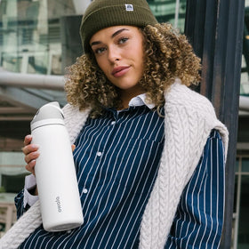 Shy Marshmallow colored Owala FreeSip bottle adds playful style.