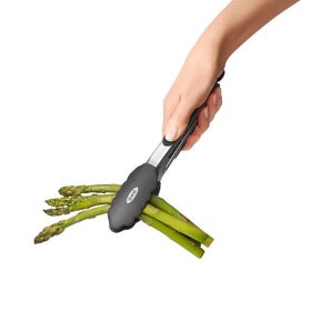 Angled silicone heads on OXO tongs for controlled flipping