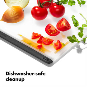 OXO Good Grips Utility Cutting Board, non-porous surface resists odors and keeps surfaces clean.