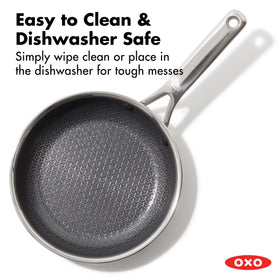 OXO Hybrid 10-inch pan handle close-up showcases stay-cool ergonomic grip