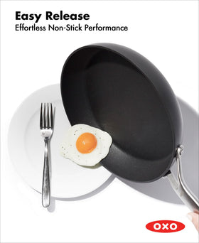 OXO Professional 10-inch pan showing induction-base compatibility for versatile heating.
