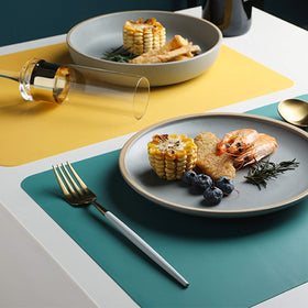 Panzexin silicone placemats resist heat and protect countertops.
