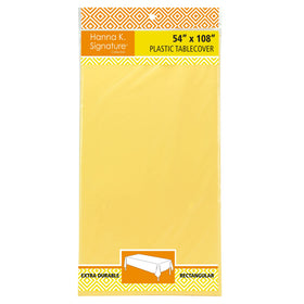Party Dimensions yellow tablecloth used in outdoor event setting.