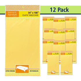 Party Dimensions yellow tablecloth presentation setup for stylish indoor event.