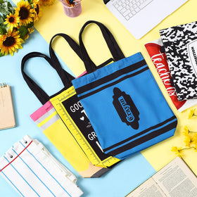Paterr teacher tote with notebook motif, reliable storage for books and devices.