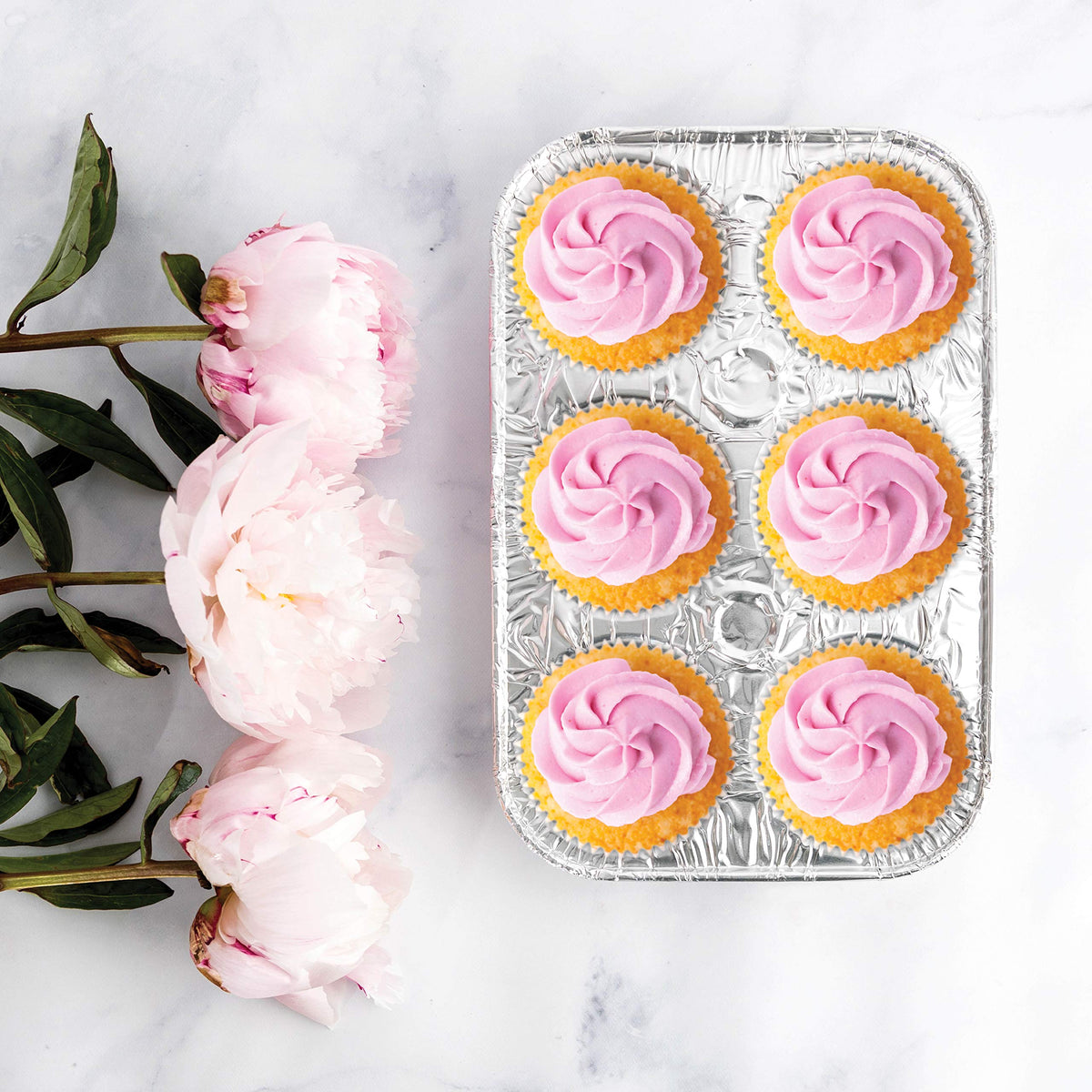 Plasticpro muffin pans ideal for party baking without cleanup.