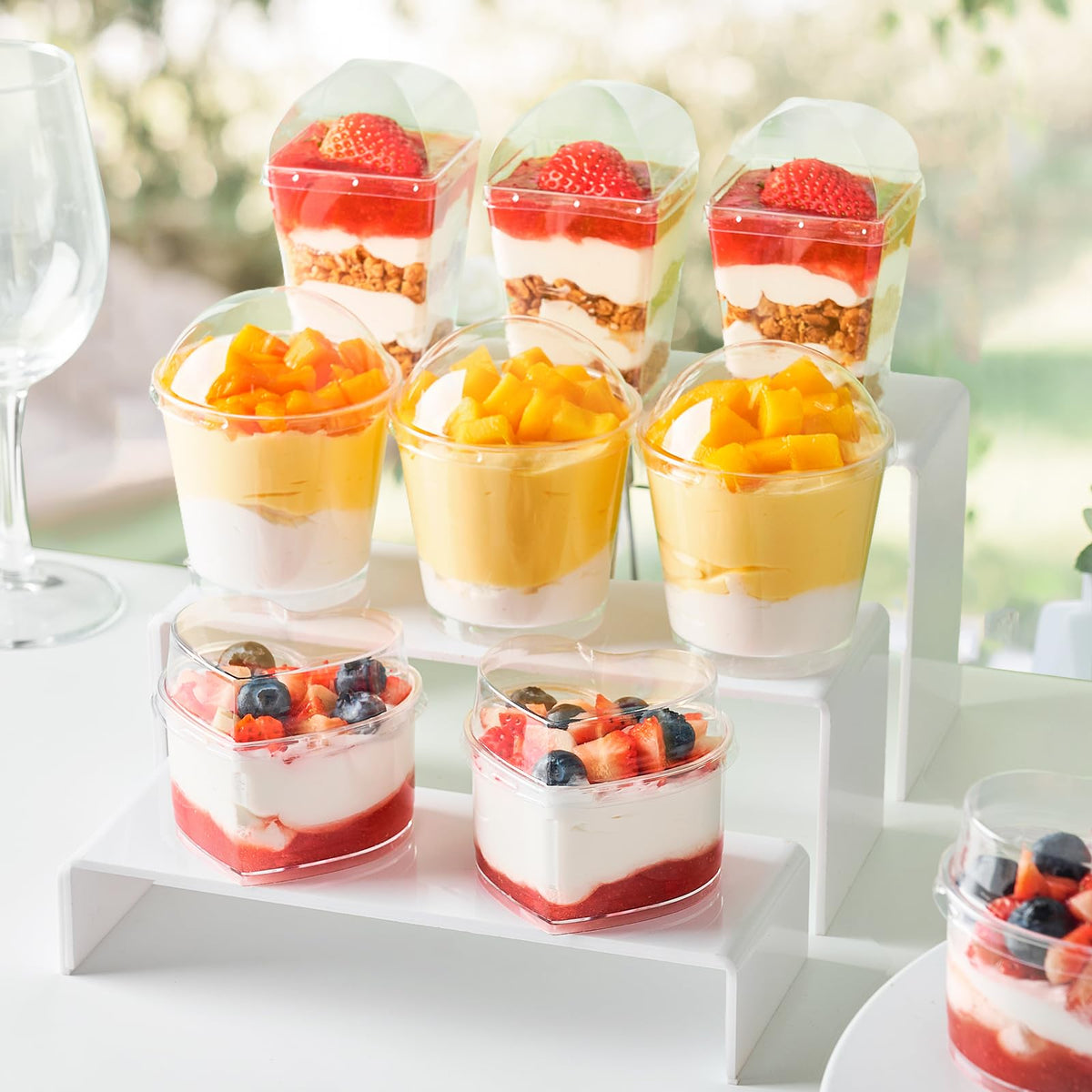 Qeirudu party serving kit with cups, lids, and spoons for events