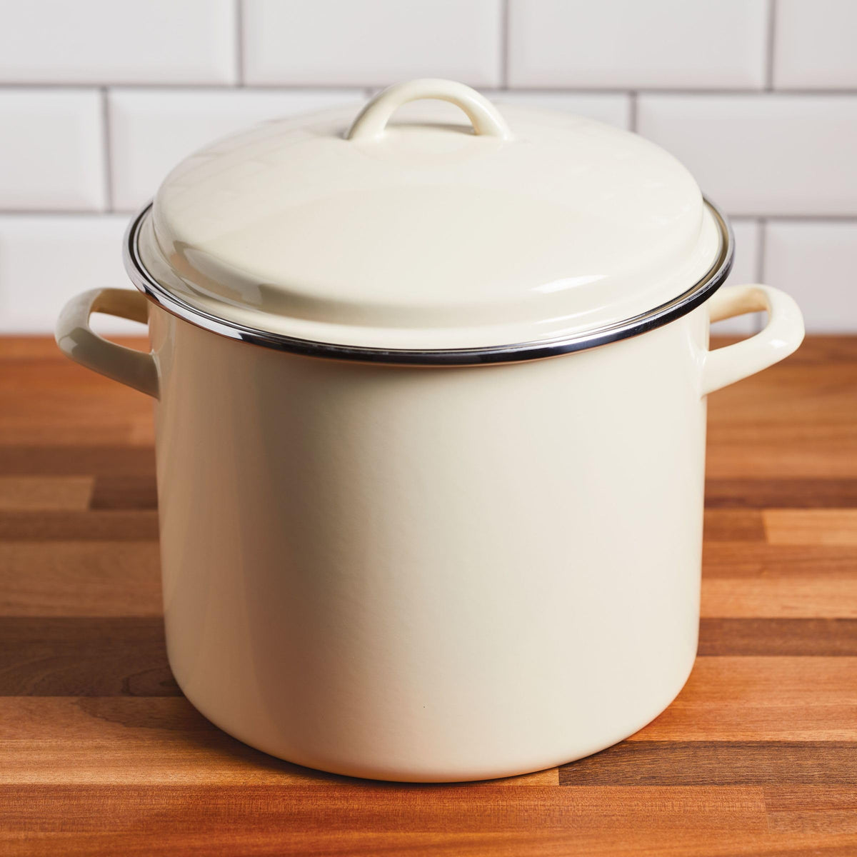 Rachael Ray stockpot with lid on stove, ready for family-sized meals.