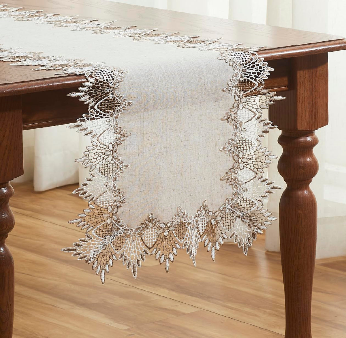Raedan linen runner draped over a dresser, adding subtle elegance to decor.