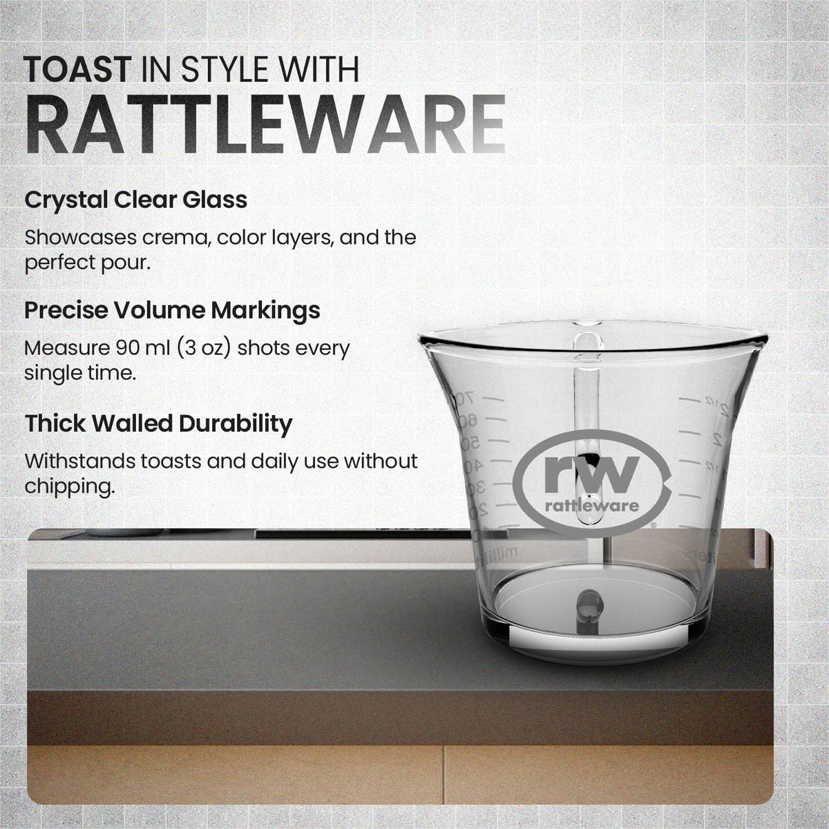 Rattleware barista measuring cup with ml and oz graduations for accurate dosing.