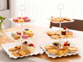 RAUVOLFIA two pack white stands suit any dessert table setup.