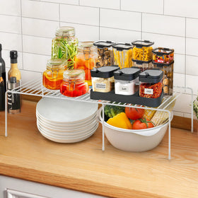 Ravinte adjustable-length shelf maximizes cabinet space for pantry items.