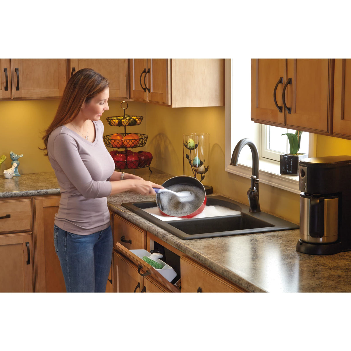 Rev-A-Shelf tip-out tray hinges close-up showing self-holding design for easy setup.