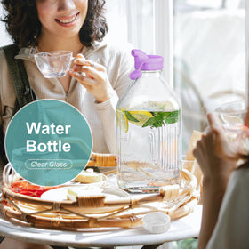 Ritayedet BPA-free glass bottle ideal for juice and beverages.