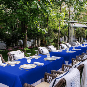 sancua Royal Blue tablecloth in banquet scene with rounded and rectangular tables
