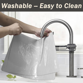 SAPID easy-clean silicone mat being wiped clean after use.