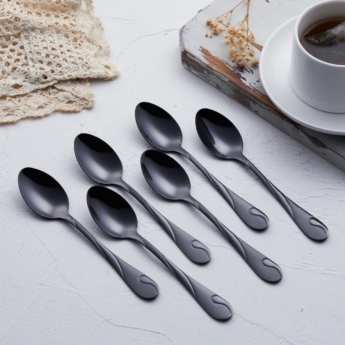 Seeshine black flatware dinner spoons with reflective shine for everyday meals.
