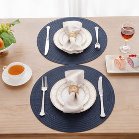 Close-up of SHACOS braided texture on placemats with shimmer detail.