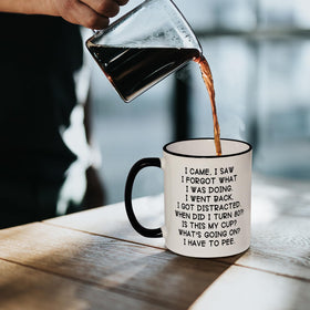 Shqiueos mug showcases a glossy ceramic finish with a bold black handle