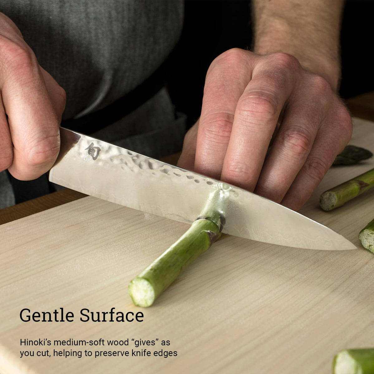 Shun Compact cutting board stored neatly on kitchen counter.