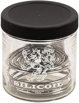 Silicoil brush cleaning tank with spiral insert cleans between bristles