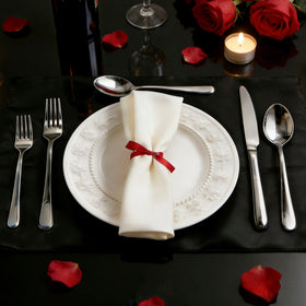 SilouC dinner knife and fork close-up in a place setting for versatile dining.