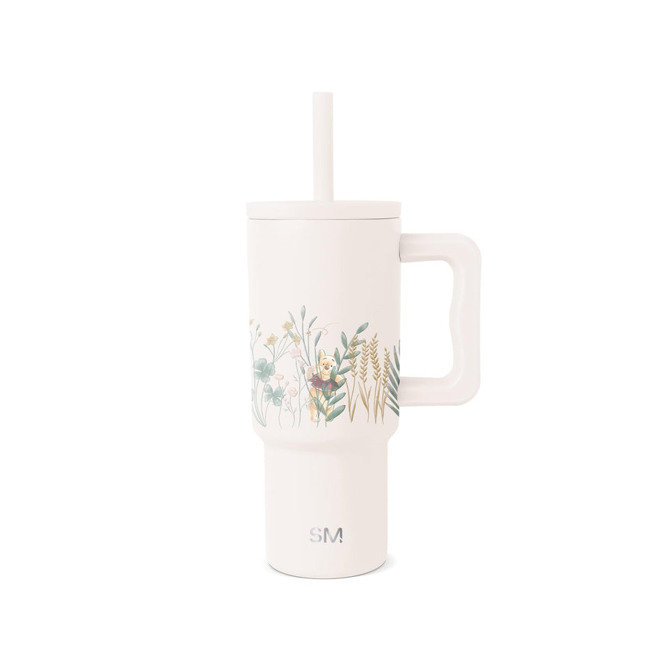Simple Modern Disney 24 oz tumbler with handle and silicone straw lid for on-the-go use.