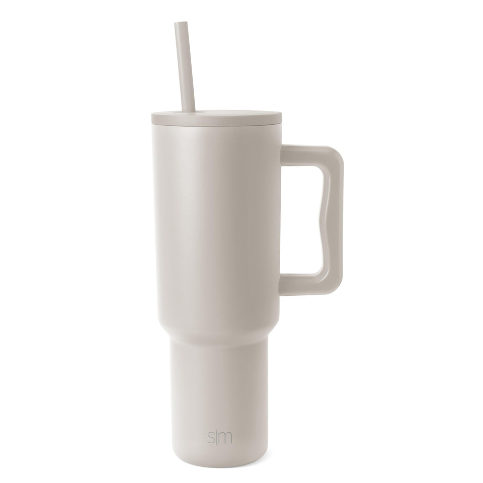 Simple Modern Trek 40oz tumbler with ergonomic handle for easy one-handed transport.