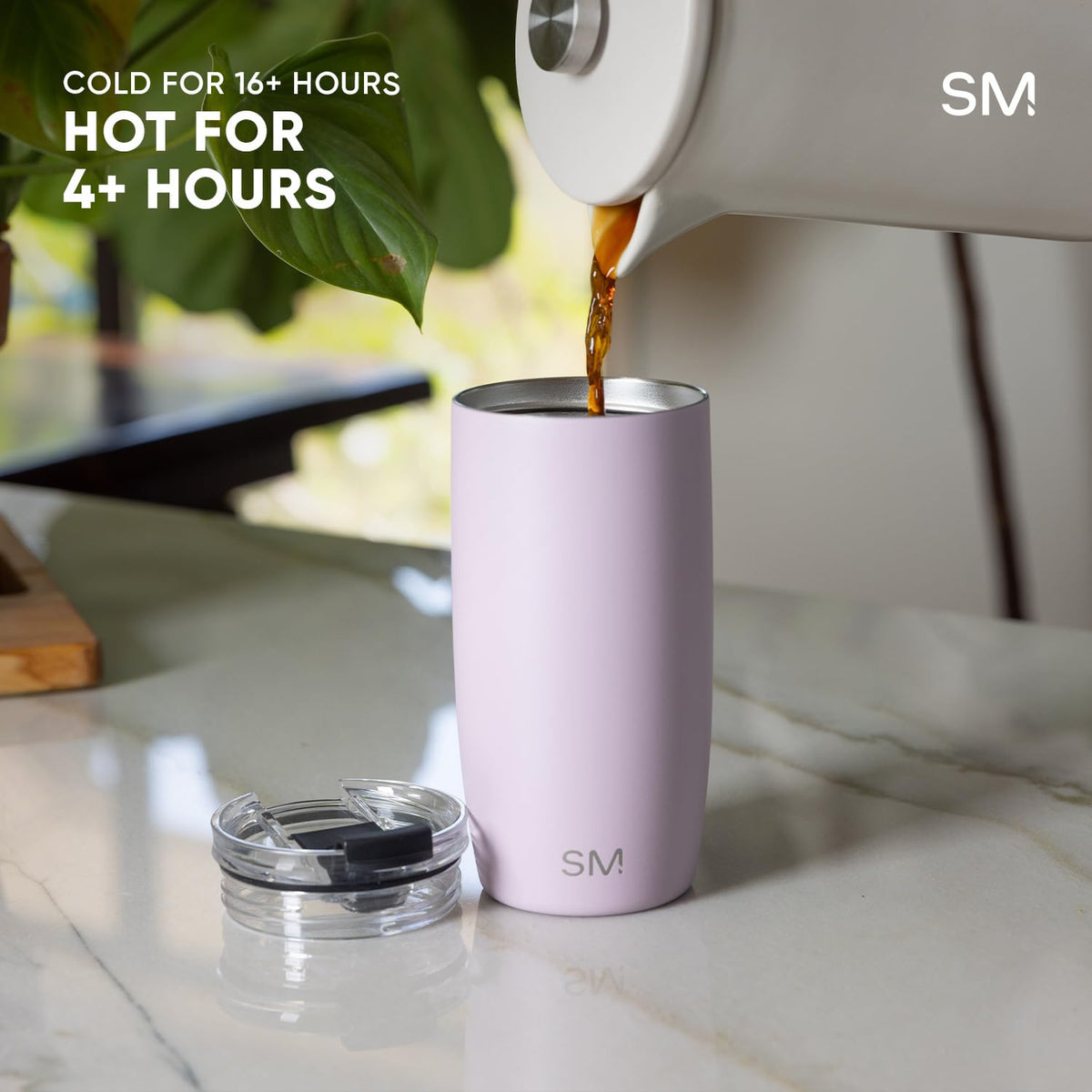 Simple Modern Voyager in car cupholder demonstrates easy, on-the-go hydration.