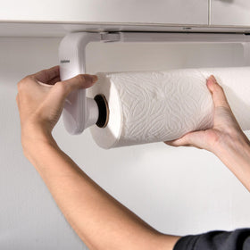 Adhesive installation on tiles or glass for clean, temporary mounting with Simpletome.