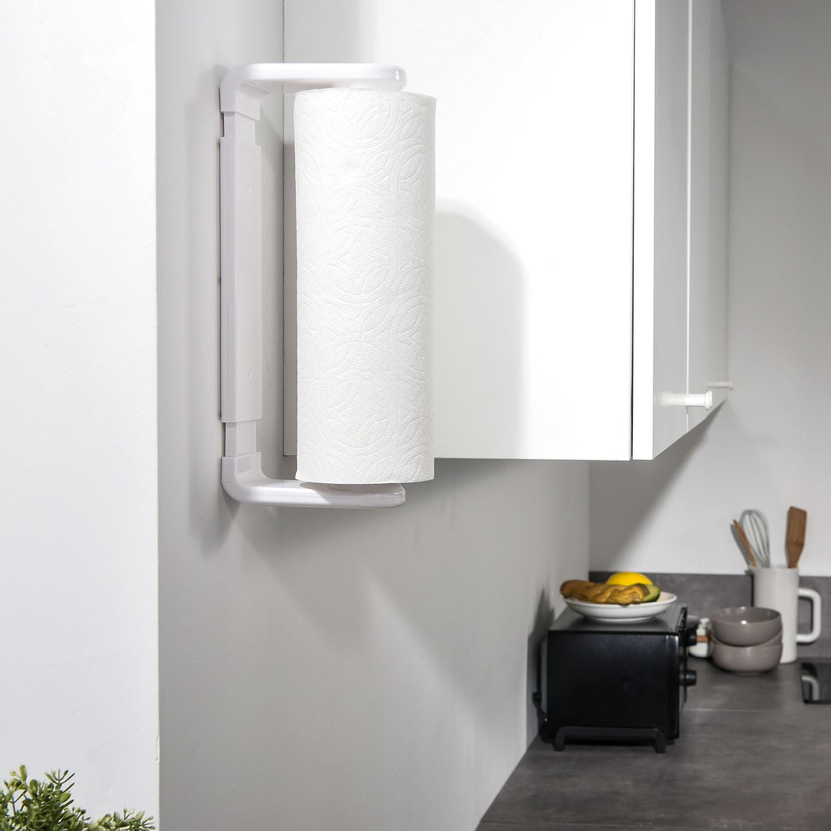 Compact design saves countertop space and tidies kitchen areas with Simpletome.