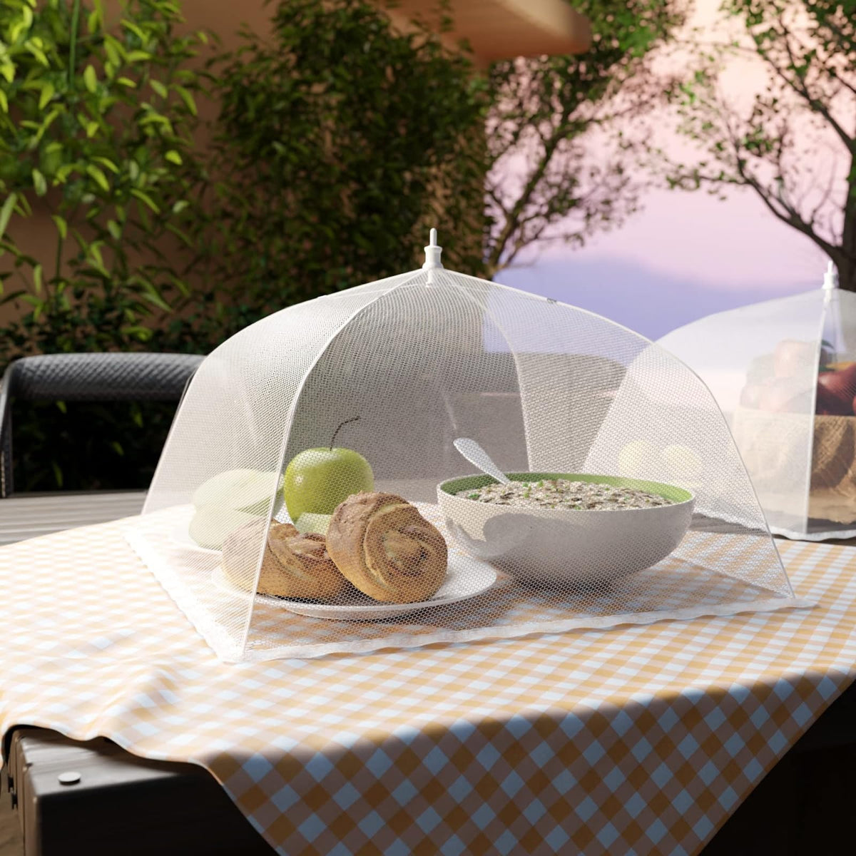 Simply Genius mesh food cover six-pack in-use shields plates during outdoor meals.