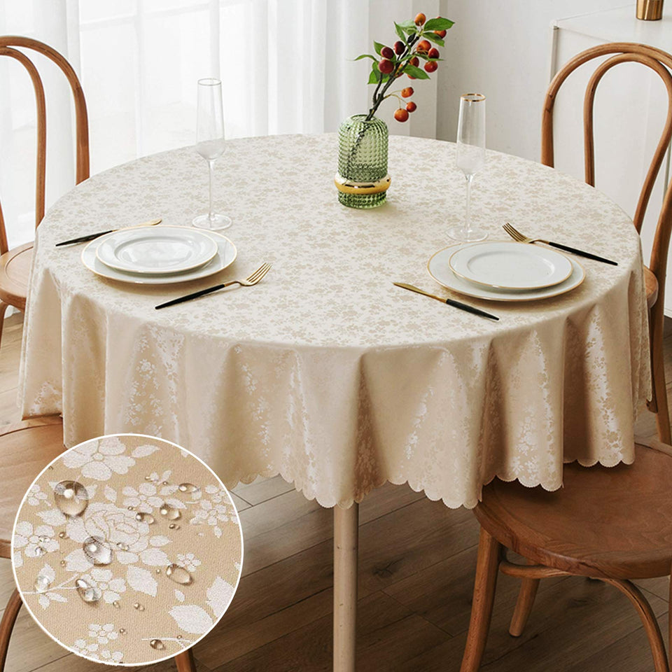 Smiry round beige table cloth with embossed floral pattern enhances everyday dining elegance.