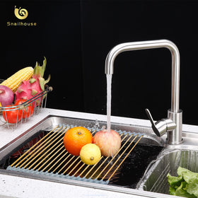 Snailhouse roll-up rack over the sink in use during daily kitchen tasks.