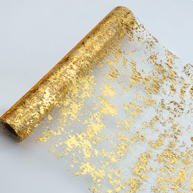 Snowkingdom glitter gold table runner wide shot showcasing shimmering decor for weddings
