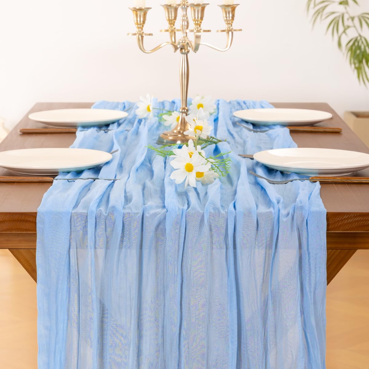Socomi blue cheesecloth runner for Valentines Day creates soft, inviting dining vibes.