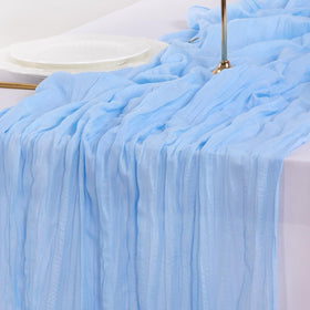 Socomi blue table runner adding festive ambiance to holiday dinners.