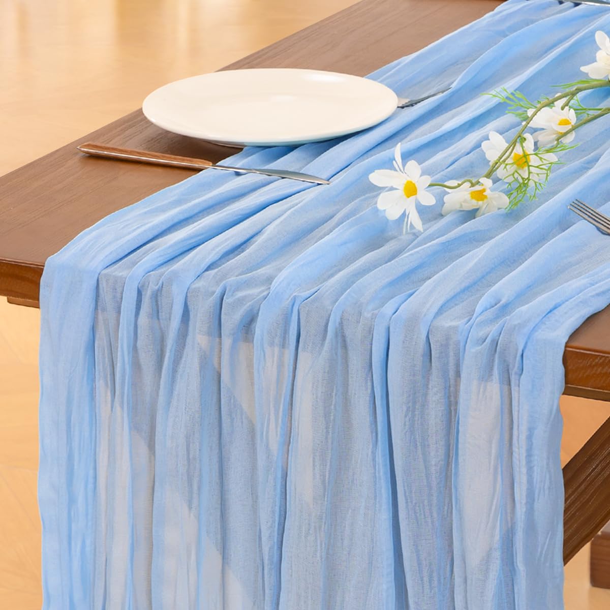 Socomi blue summer cheesecloth table runner with soft drape for elegant wedding tables.