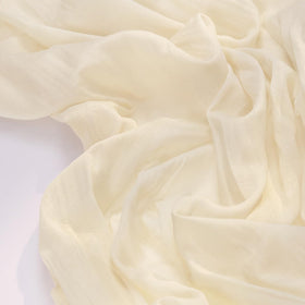Socomi cheesecloth weave close-up shows soft rustic texture and natural hand-dyed finish.