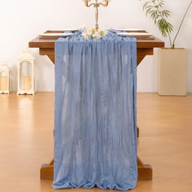 Socomi boho wedding decor with this dusty blue runner creates rustic, romantic tables.
