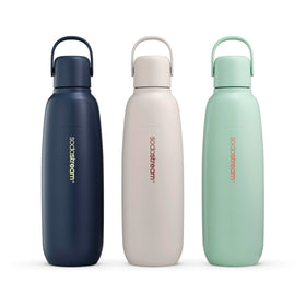 Sodastream Fizz & Go bottle in Storm inside a car, showcasing travel-friendly hydration.